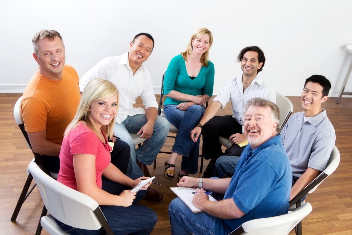 The photo shows a group of financially savvy people.