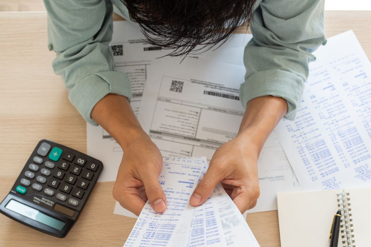 The photo shows a man doing the financial check-ins.