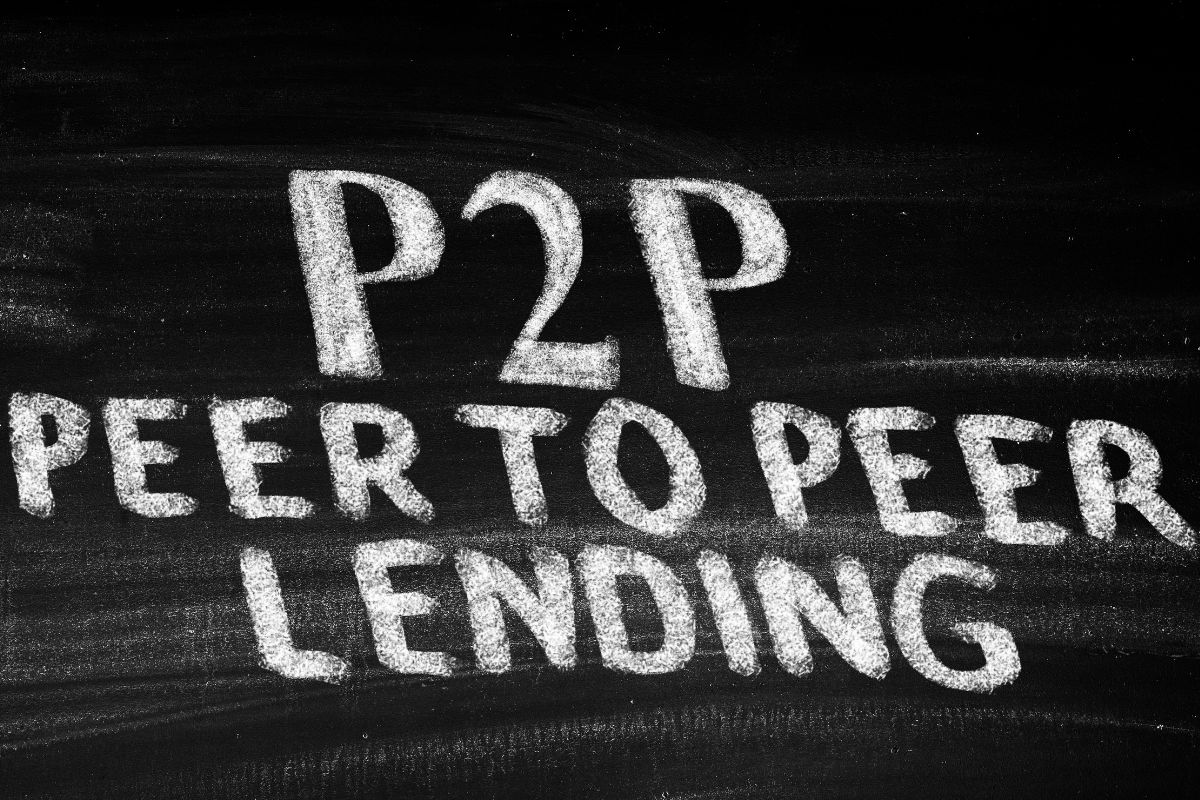 The photo shows a board with peer-to-peer lending written.