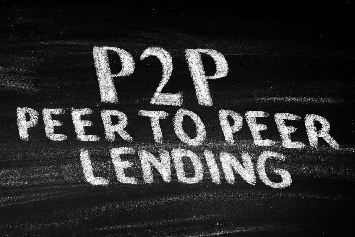 The picture tells about a board with chalk notes which refers to peer-to-peer lending can help grow your wealth with minimal ongoing effort.