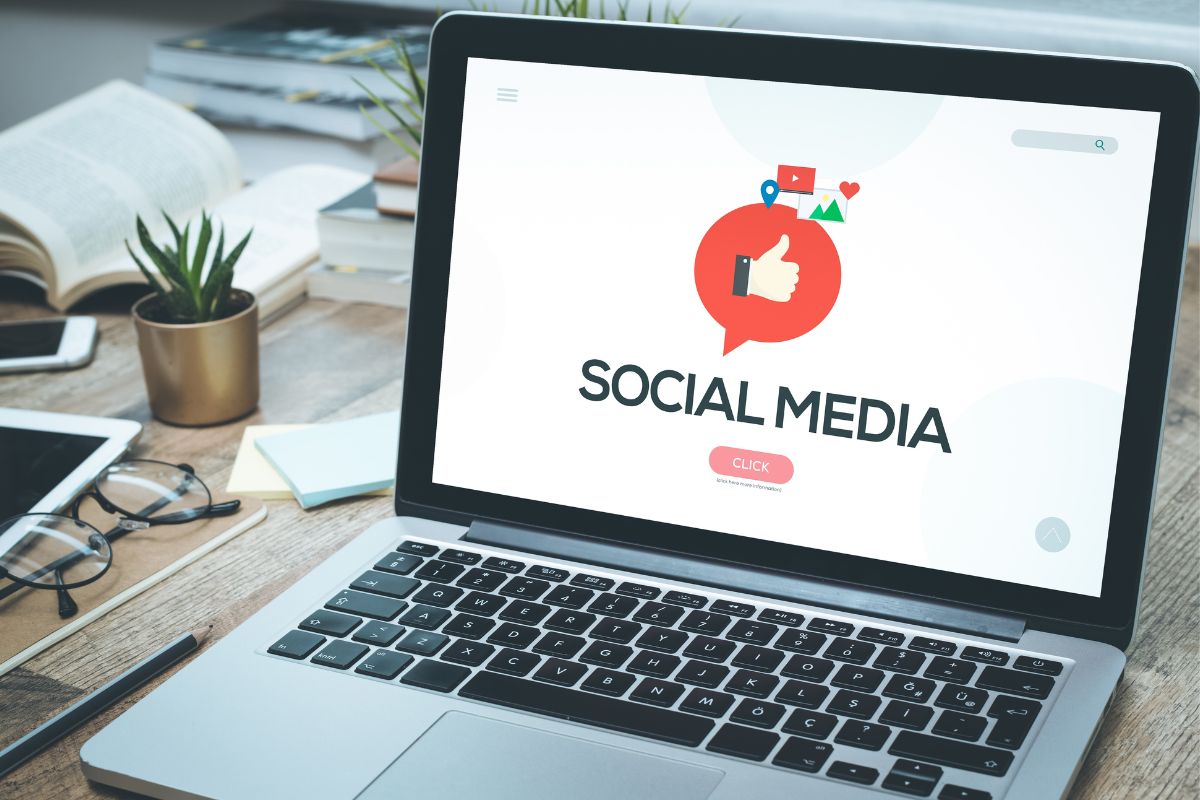 The picture of a laptop with a social media screen display.