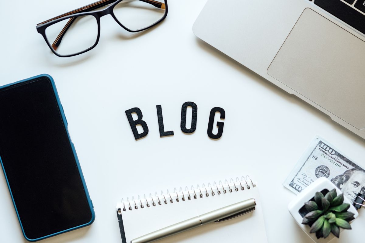 The picture of a laptop and blog wording.