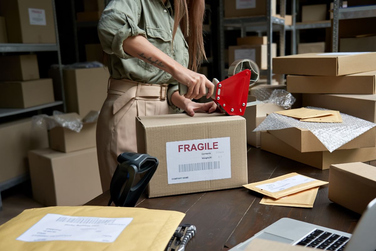 The photo of a woman with a dropshipping business.