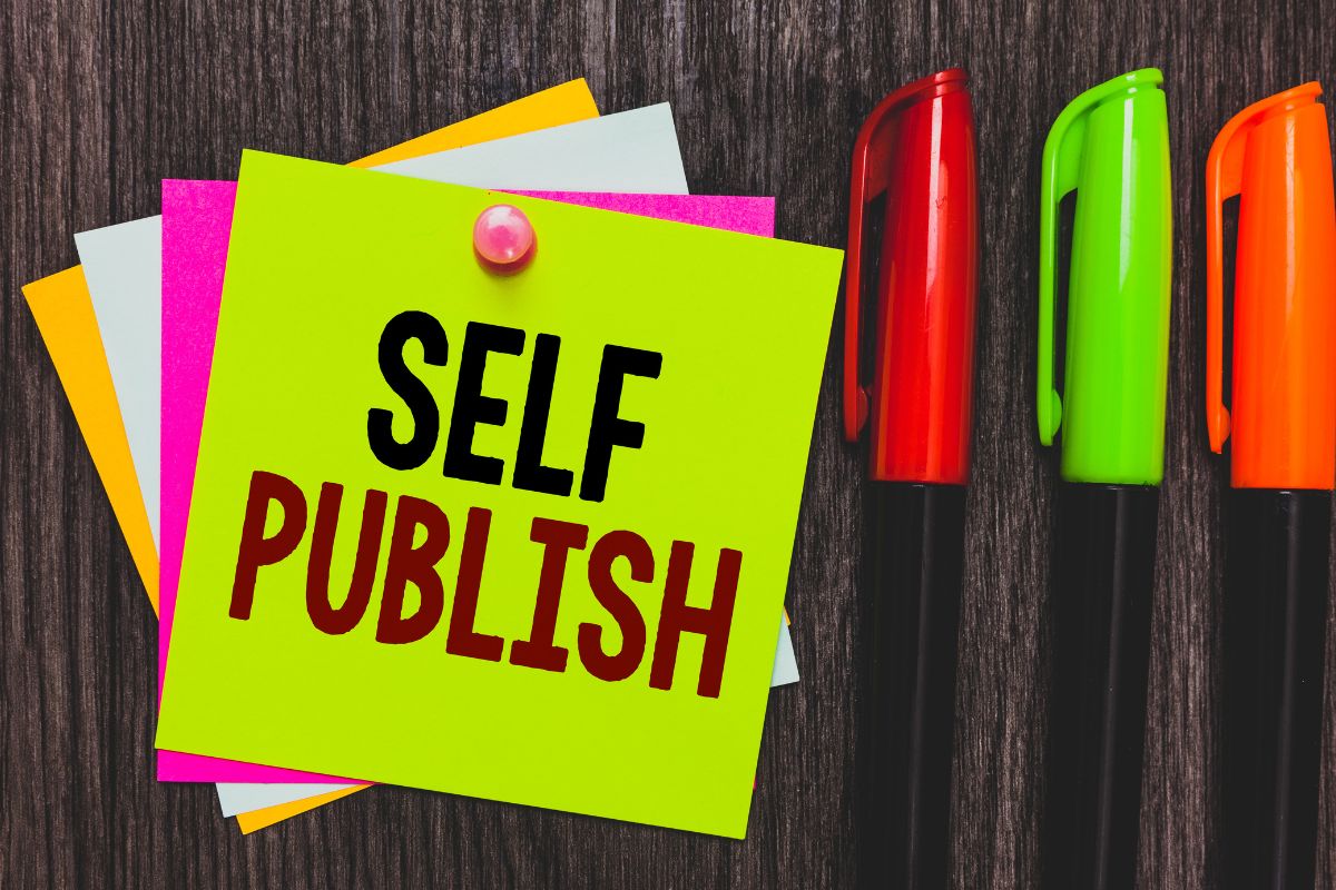 The picture of pens and paper with self-published wording.
