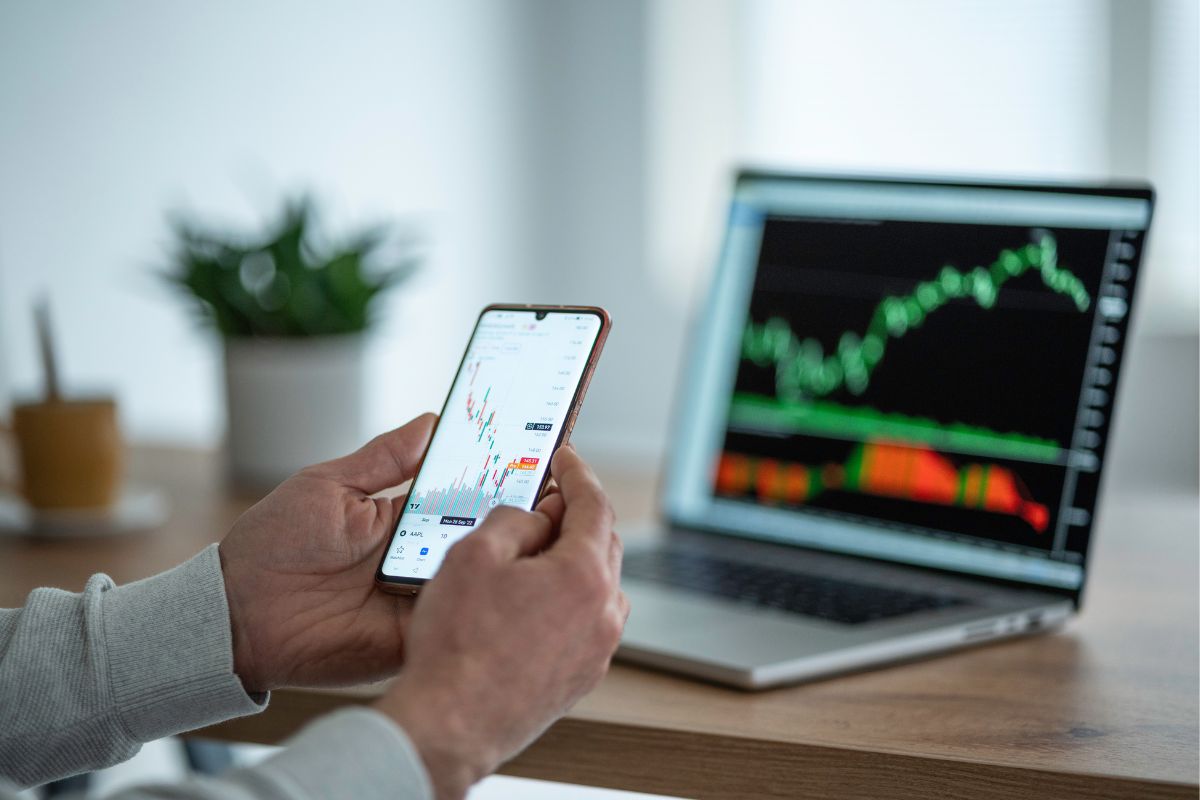 The picture of a man trading stocks.
