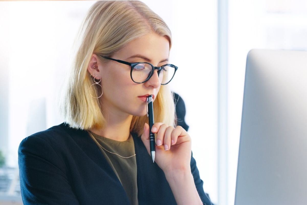 A photo of a woman making a decision.