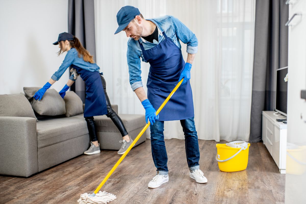 The picture is about a girl arranging the pillow on the couch and a man mapping the floor which refers to offering odd jobs as a flexible way to make money without a long-term commitment.
