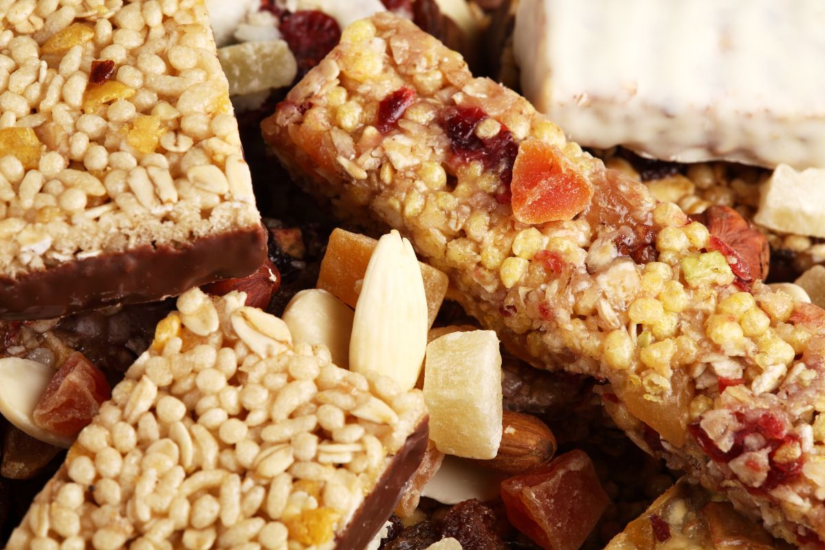 The image tells about sugary granola bars that cost more than homemade options, cutting these from your list is an easy way to save money.