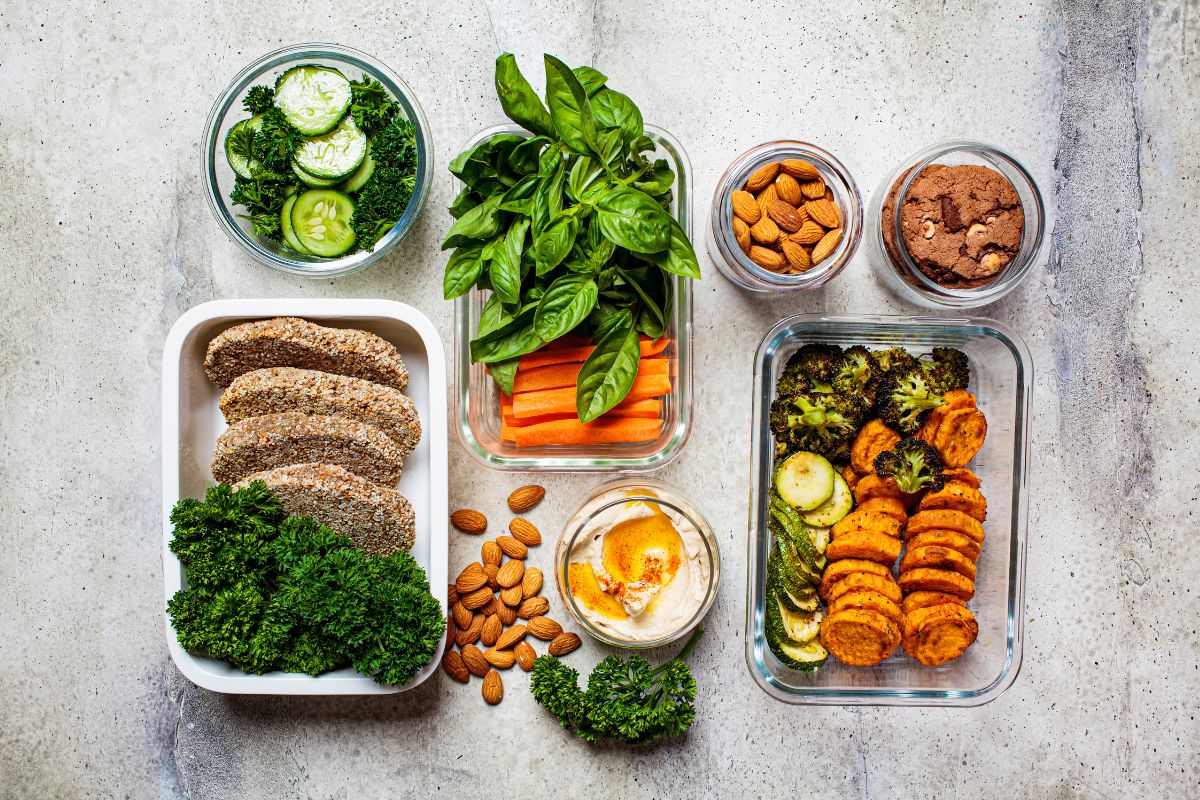 The picture tells about healthy foods in containers referring to the best cheap foods to keep on hand that help cut unnecessary items on grocery costs and save money.