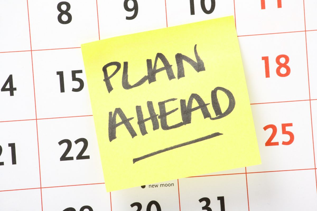 The image tells about a calendar with a piece of paper with notes referring to many people successfully completing with proper planning and finding ways to work with what they have.