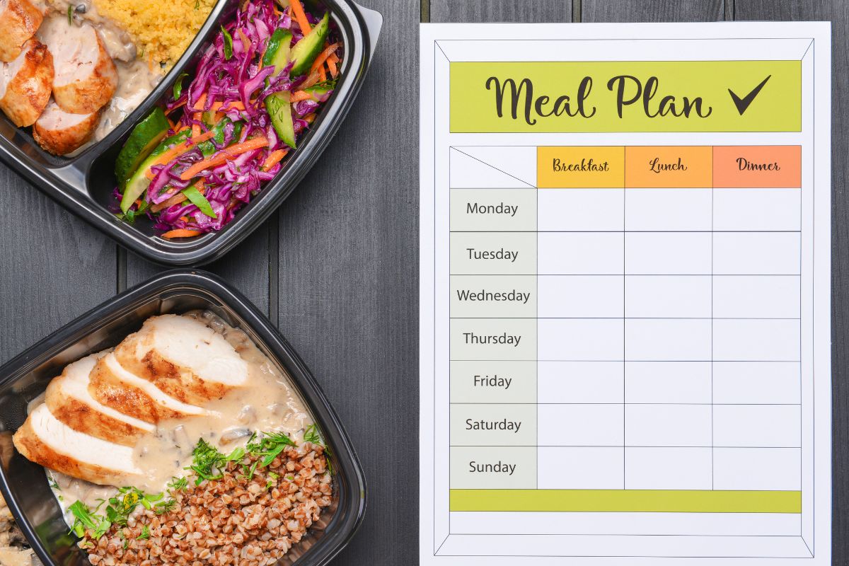 The image tells about meals on the containers and a piece of paper with notes indicating that meal planning and cooking at home is one of the easier ways to save money.