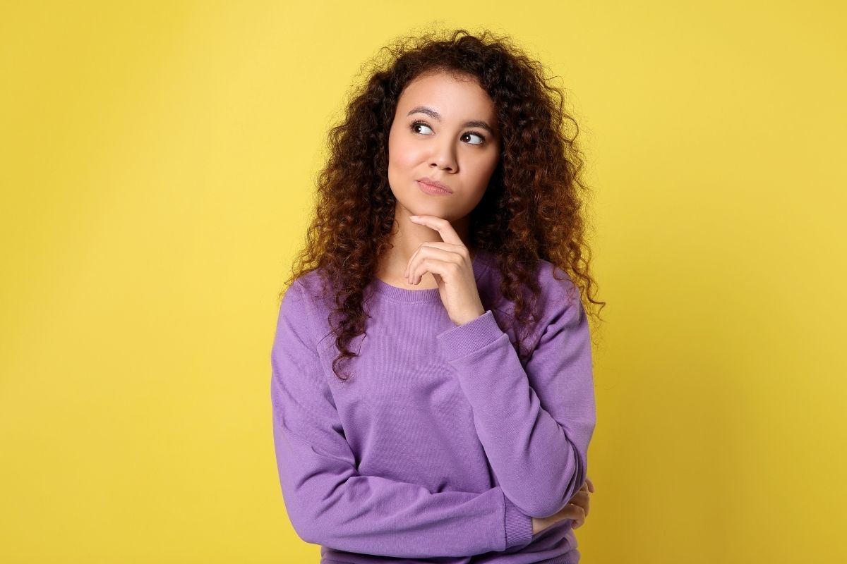 An image of a woman thinking.