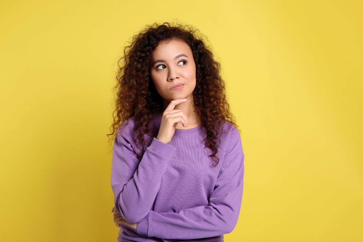 The picture of a curly-haired girl refers to knowing your why to improve and using that as a guide for every decision.