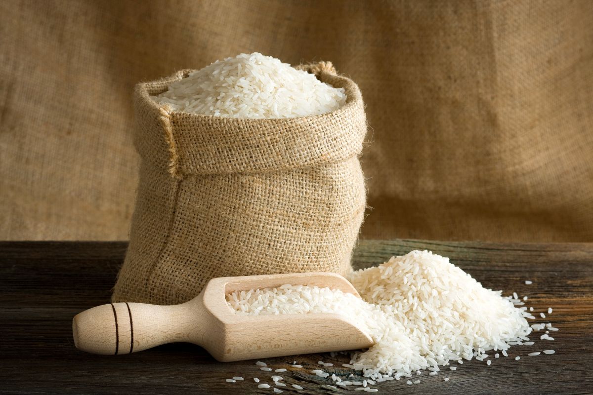 The image tells about a sock with rice and a scoop with rice referring to purchasing in bulk for items you use frequently reducing the chance of impulse buys.