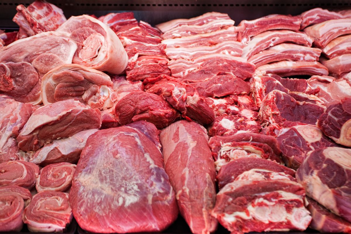 The photo shows red meats referring to how limiting meat consumption helps stretch a grocery budget further.