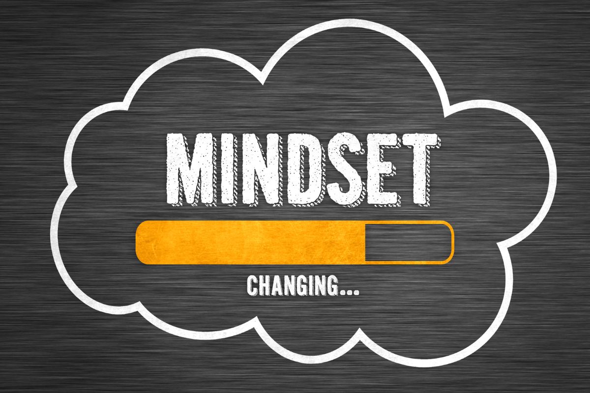 The photo shows a board with notes referring to small mindset shifts that lead to lasting habits and make a difference over time.
