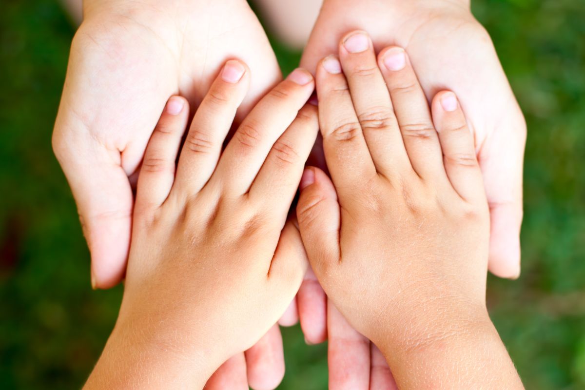 The picture of the mother and son's hands.