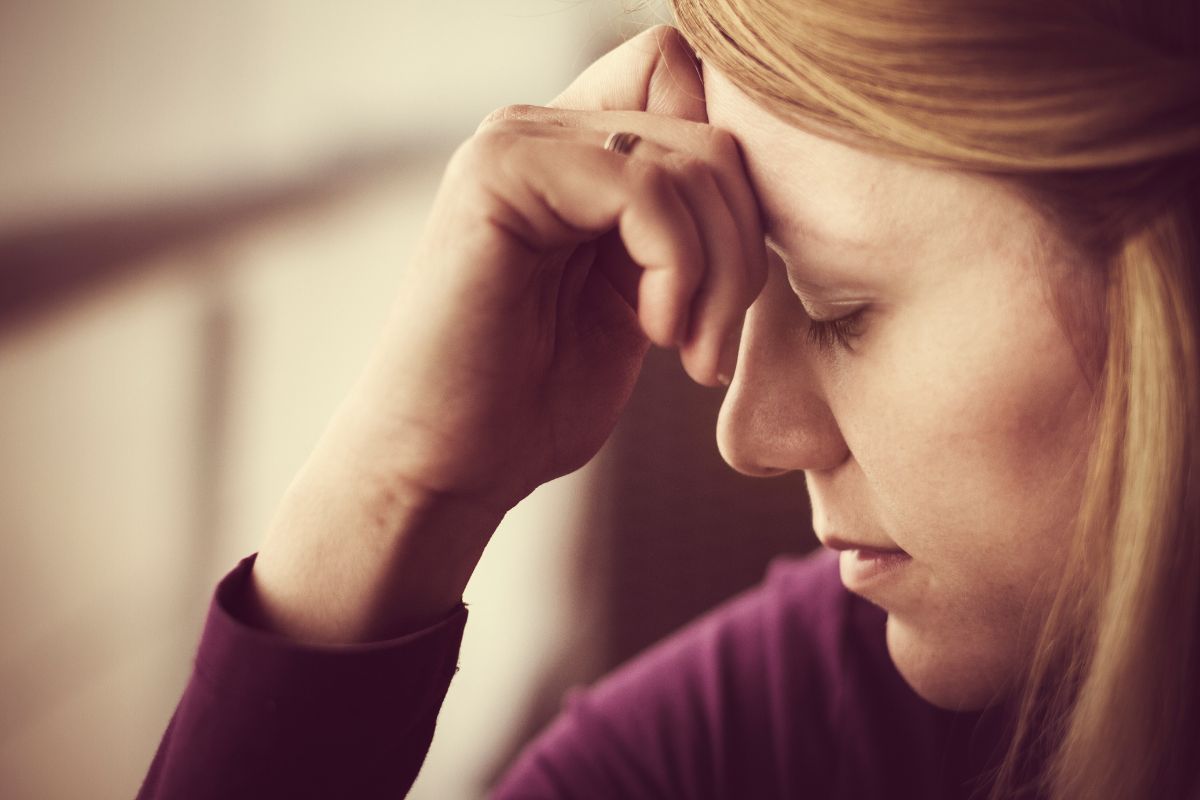 The image is about a frustrated girl who says guilt doesn't change the situation and focusing on solutions instead of it will put both of you in a better position.