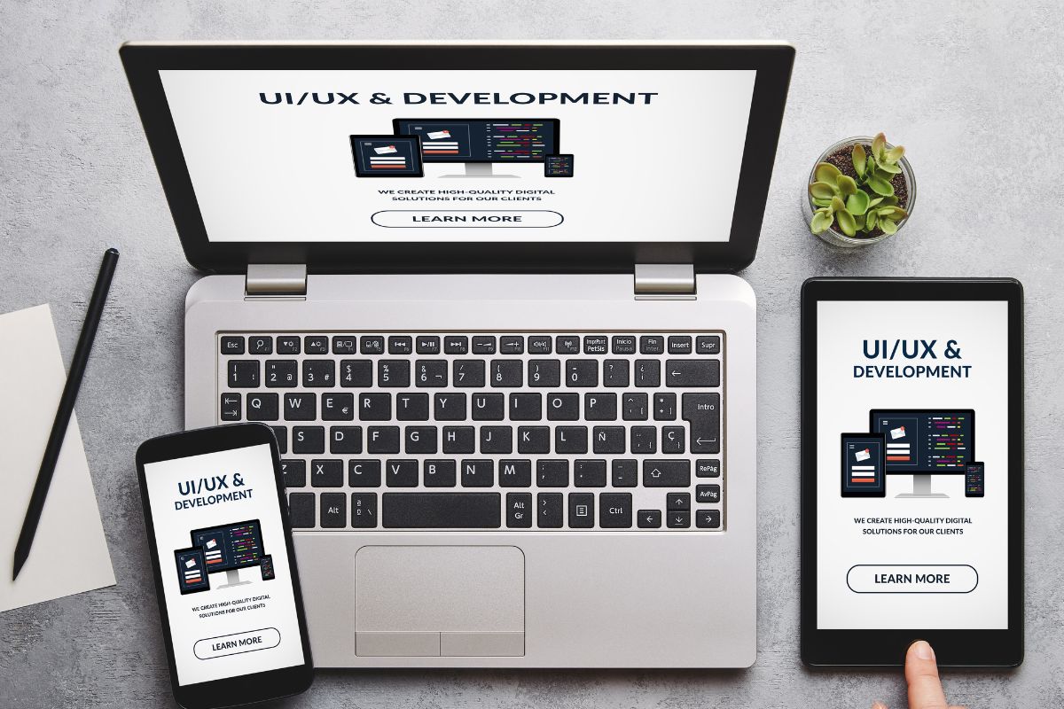 The picture shows gadgets with UX/UI design.