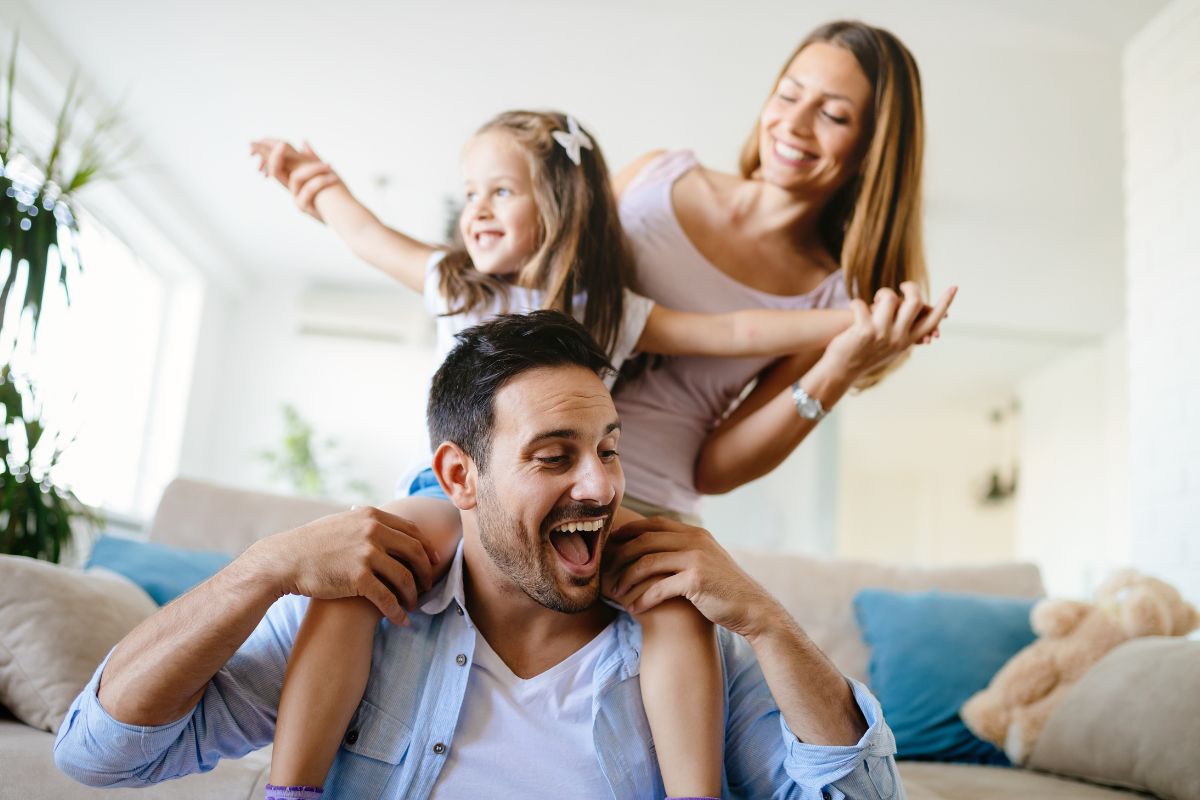 The image tells about a group of the family having quality time together which refers to no spend month and encourages appreciation for non-material joys that can lead to a more fulfilling lifestyle.