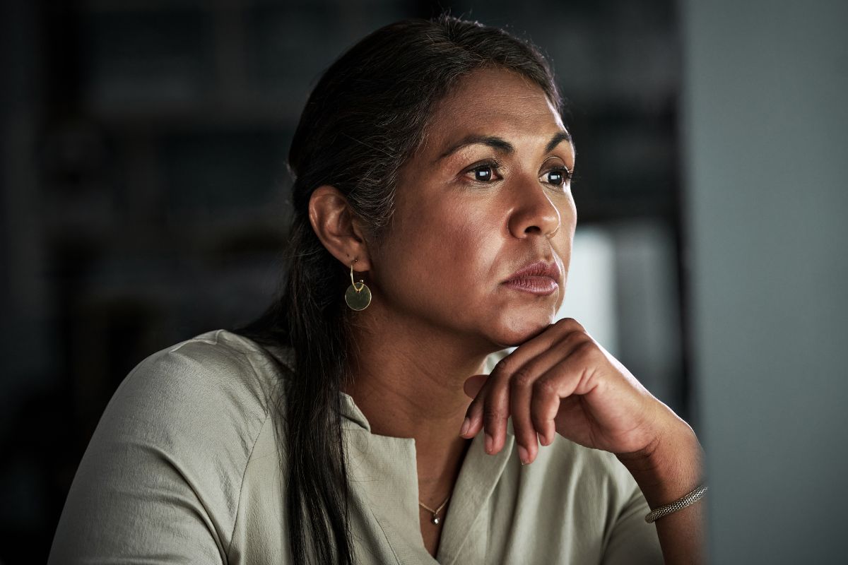 The photo shows a woman focusing on abundance.