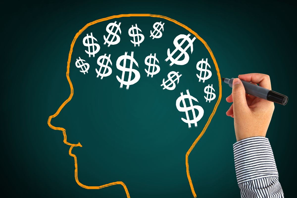 The picture shows a woman illustrating money beliefs.