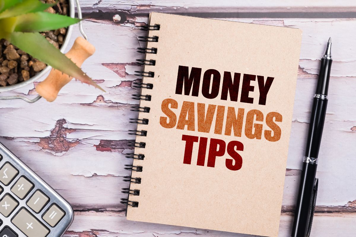 An image of a notebook with money-saving tips wording.