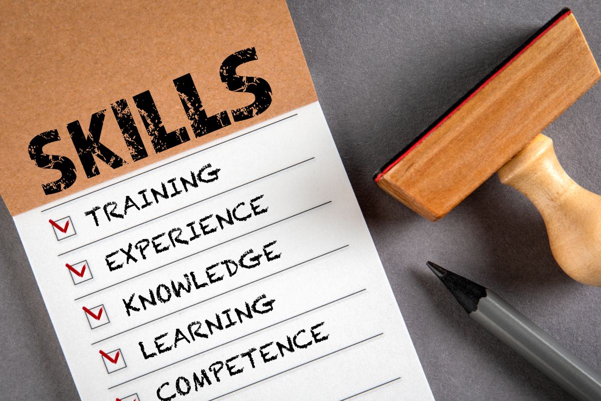 The photo of a notebook with skills content and a stamp.