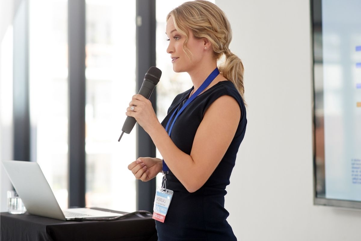 An image of a woman public speaking.