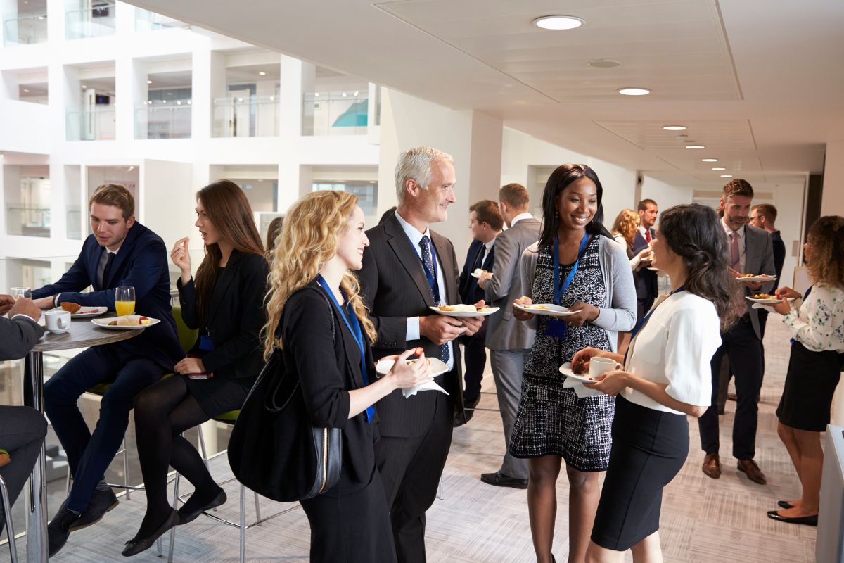 The image shows networking and relationship building.