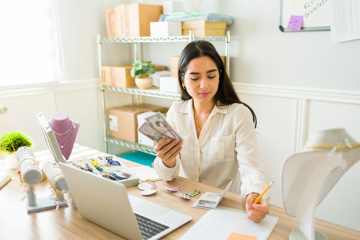 An image of a woman doing an inventory of sales.