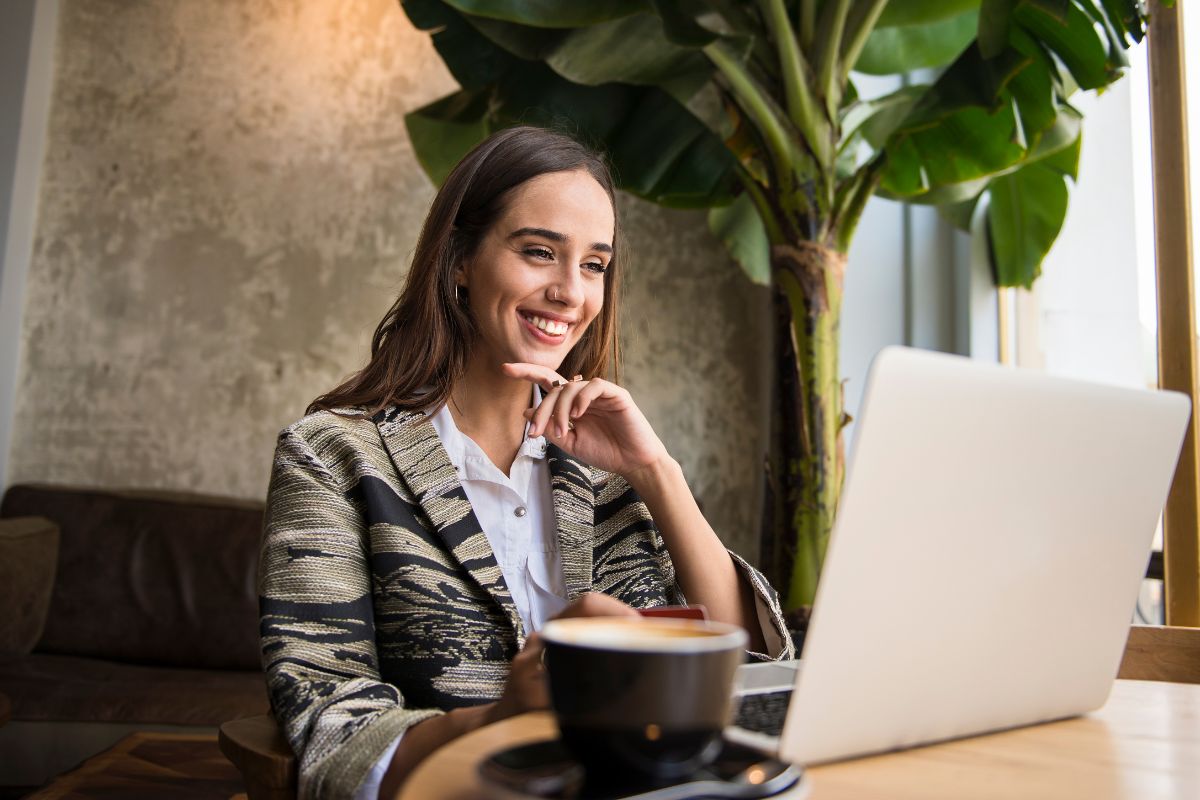 A photo of a woman using an online platform to sell.