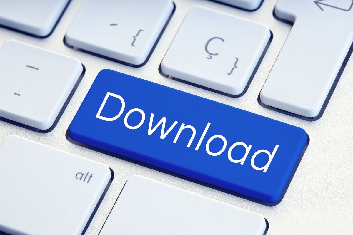 The image shows a keyboard with a blue button with a note indicating to download your no-spend challenge template and enjoy the challenge of finding joy in what you already have.