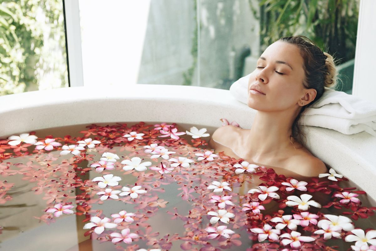 The picture shows a woman relaxing in a home spa.