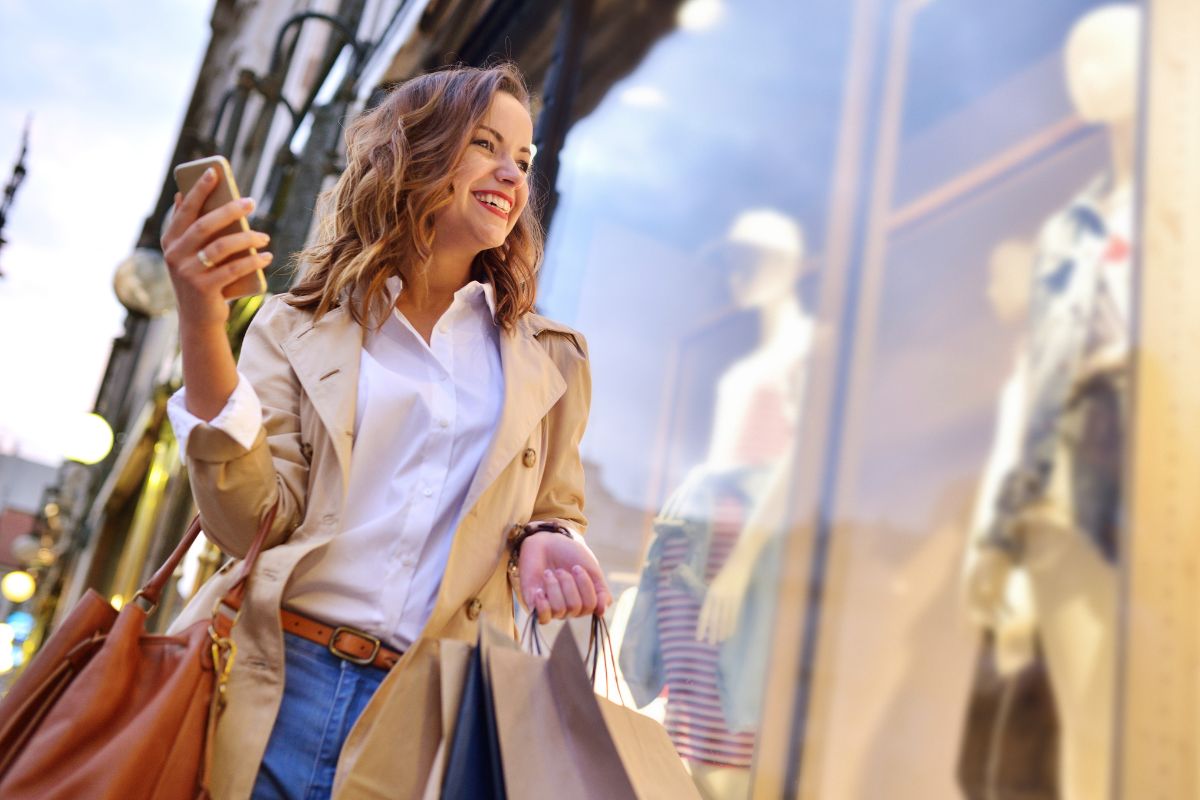 An image is of a woman with spending triggers.