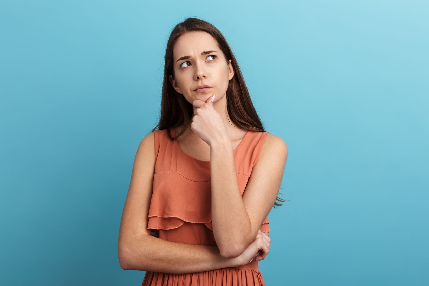 The photo shows a woman identifying emotional spending.