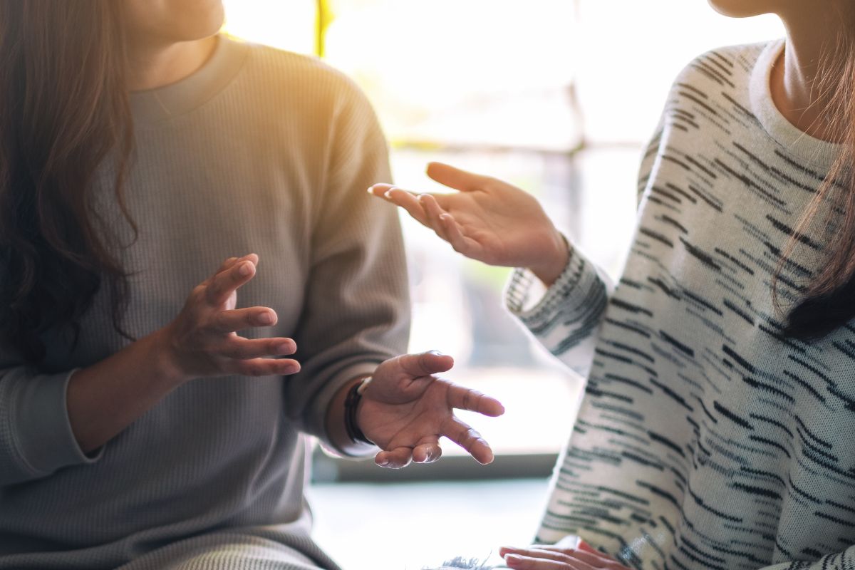 The picture is about two people talking.