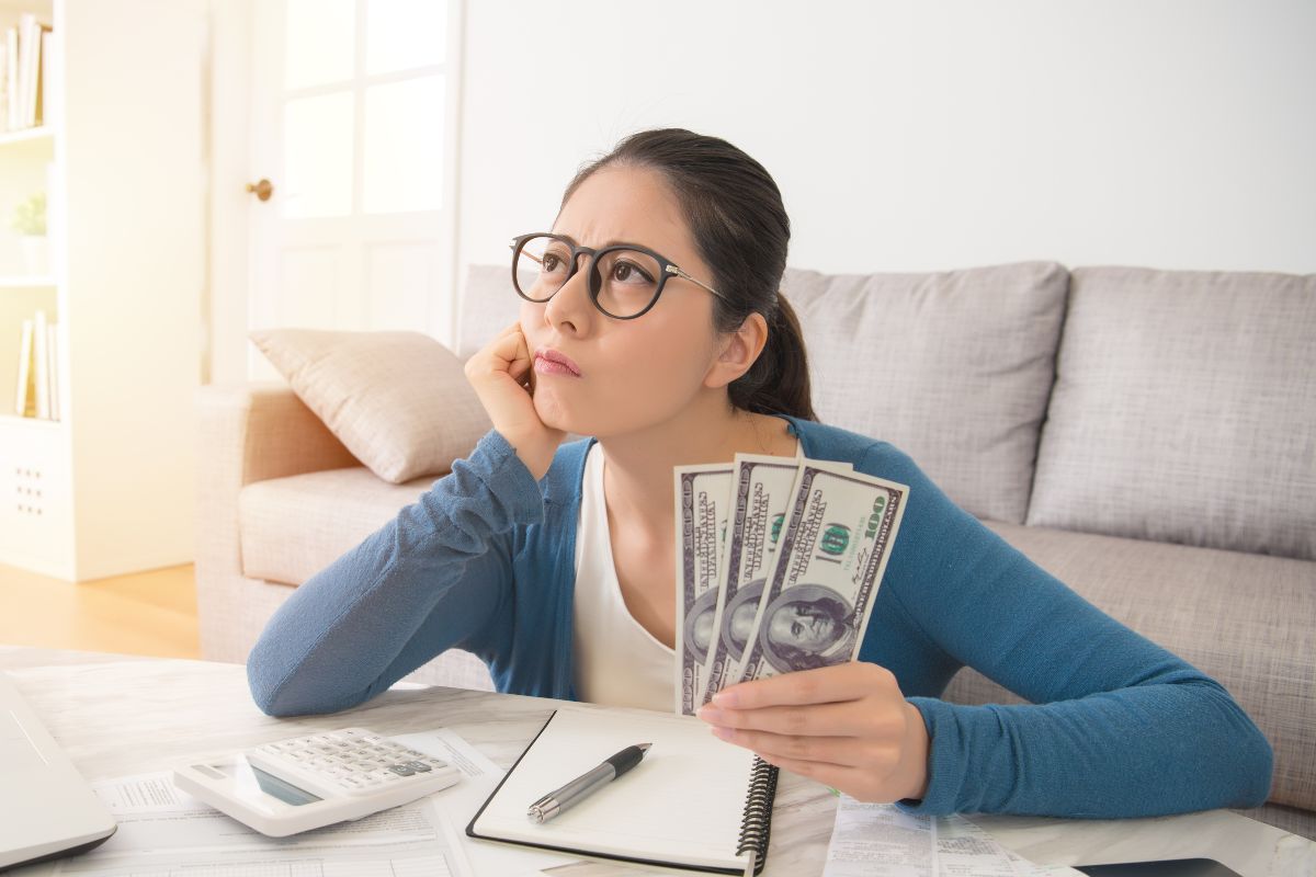 The picture is about a woman making financial decisions.