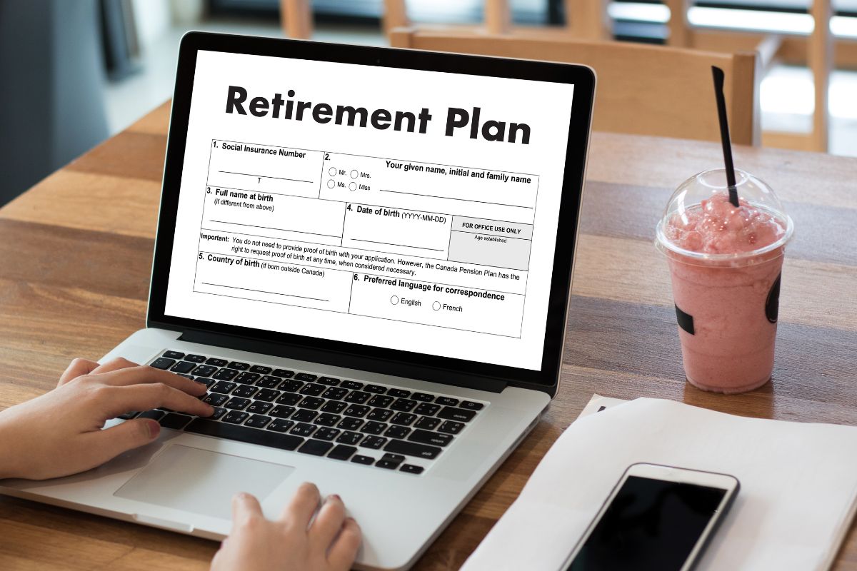 The image shows a drink, a phone, a paper, and a girl's hand using a laptop with a screen display which means planning for long-term care and retirement provides security for both you and your loved ones.