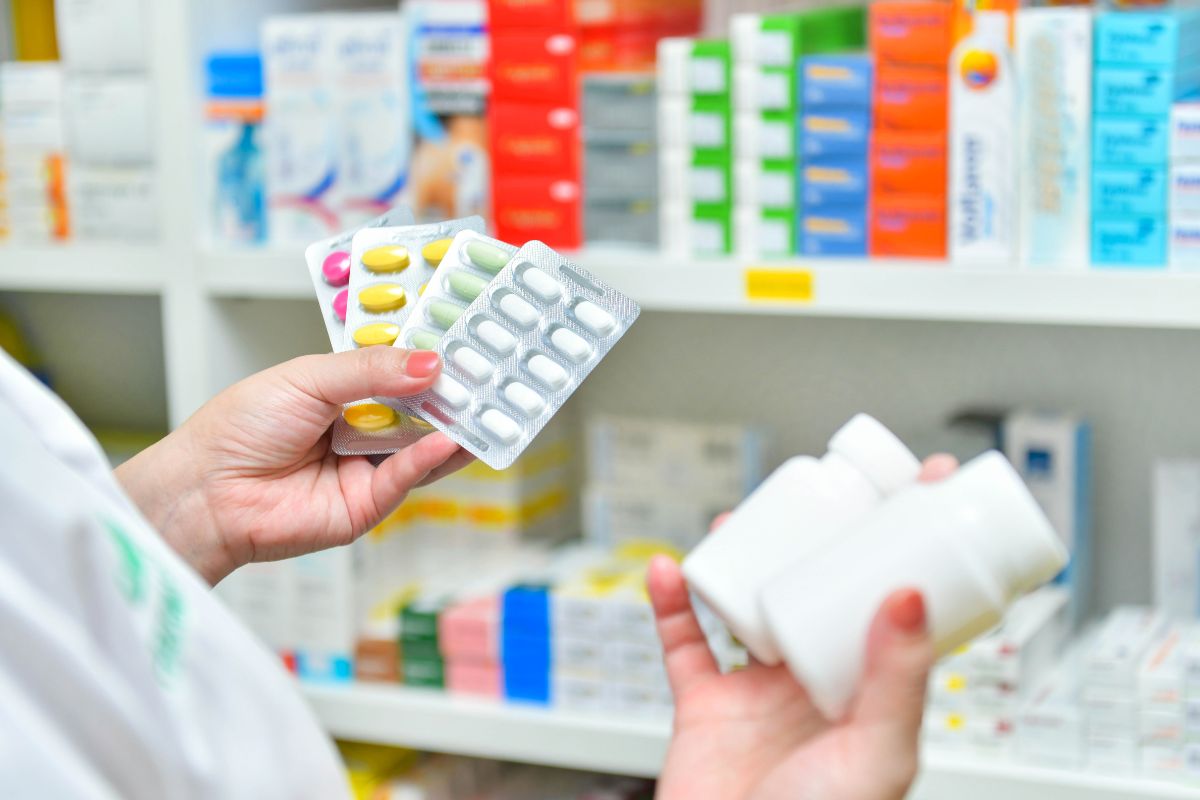 The picture shows a woman buying generic medicines.