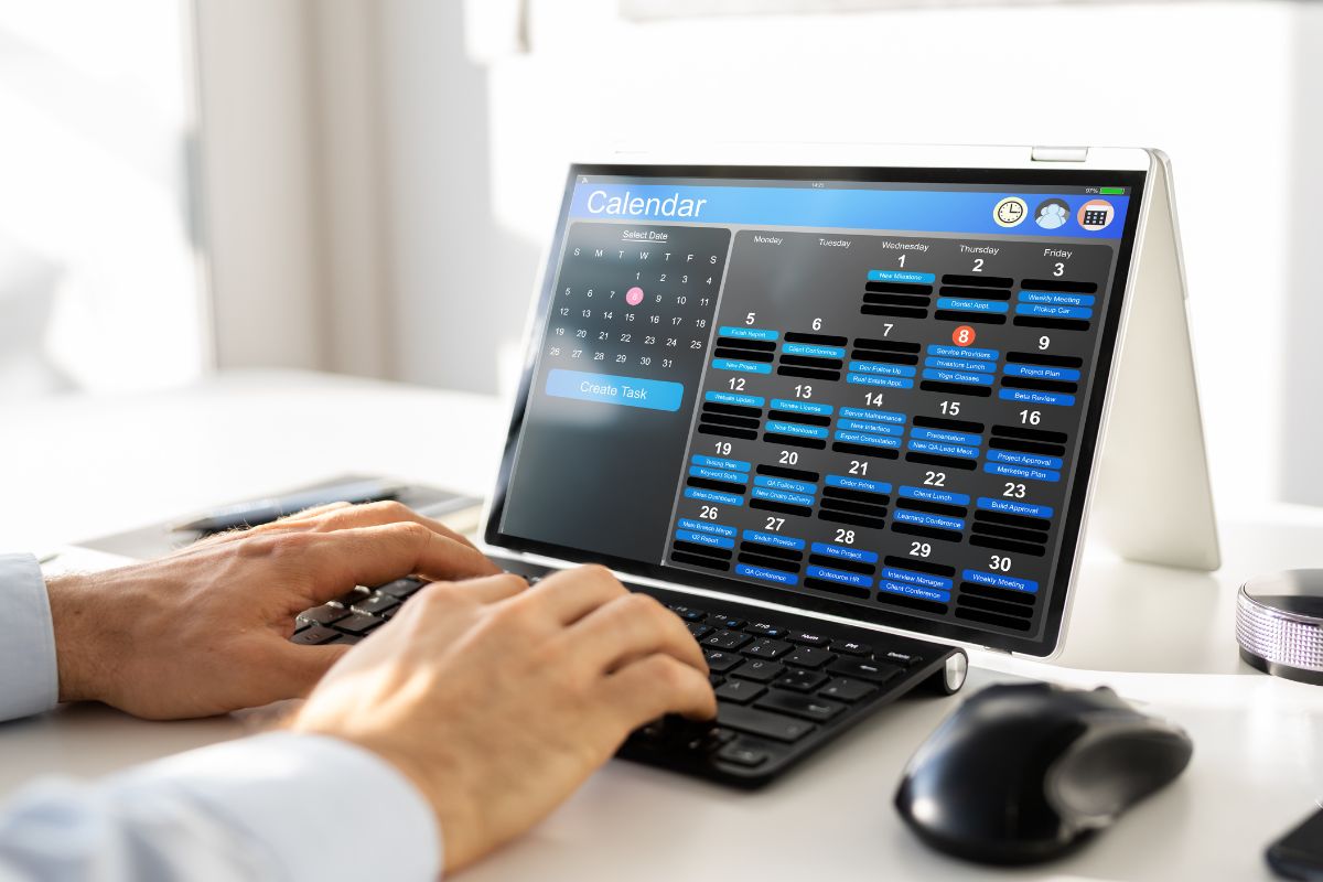 The picture shows a man making a schedule.
