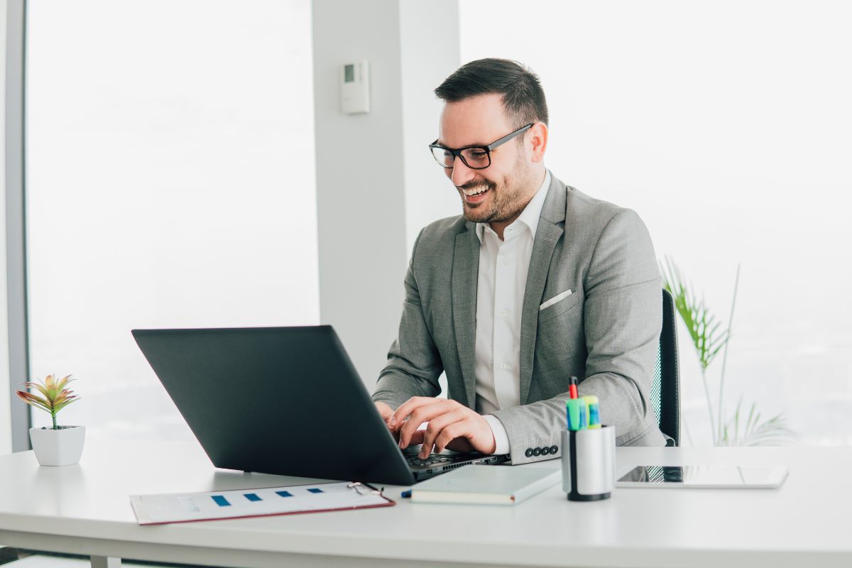 The photo shows a man working with ultra-focus.