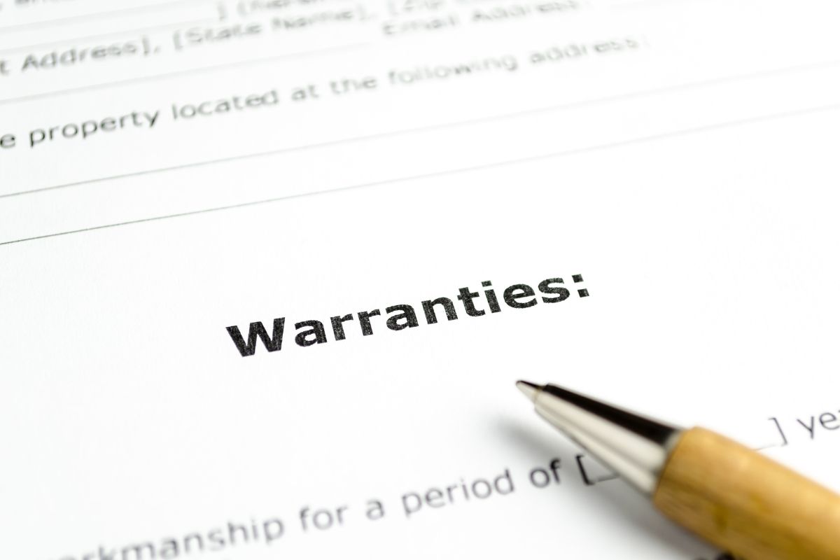 The picture tells about a pen and a piece of paper with notes which refers to extended warranties aren't worth the money, putting the money into savings can be a better way to prepare for repairs.