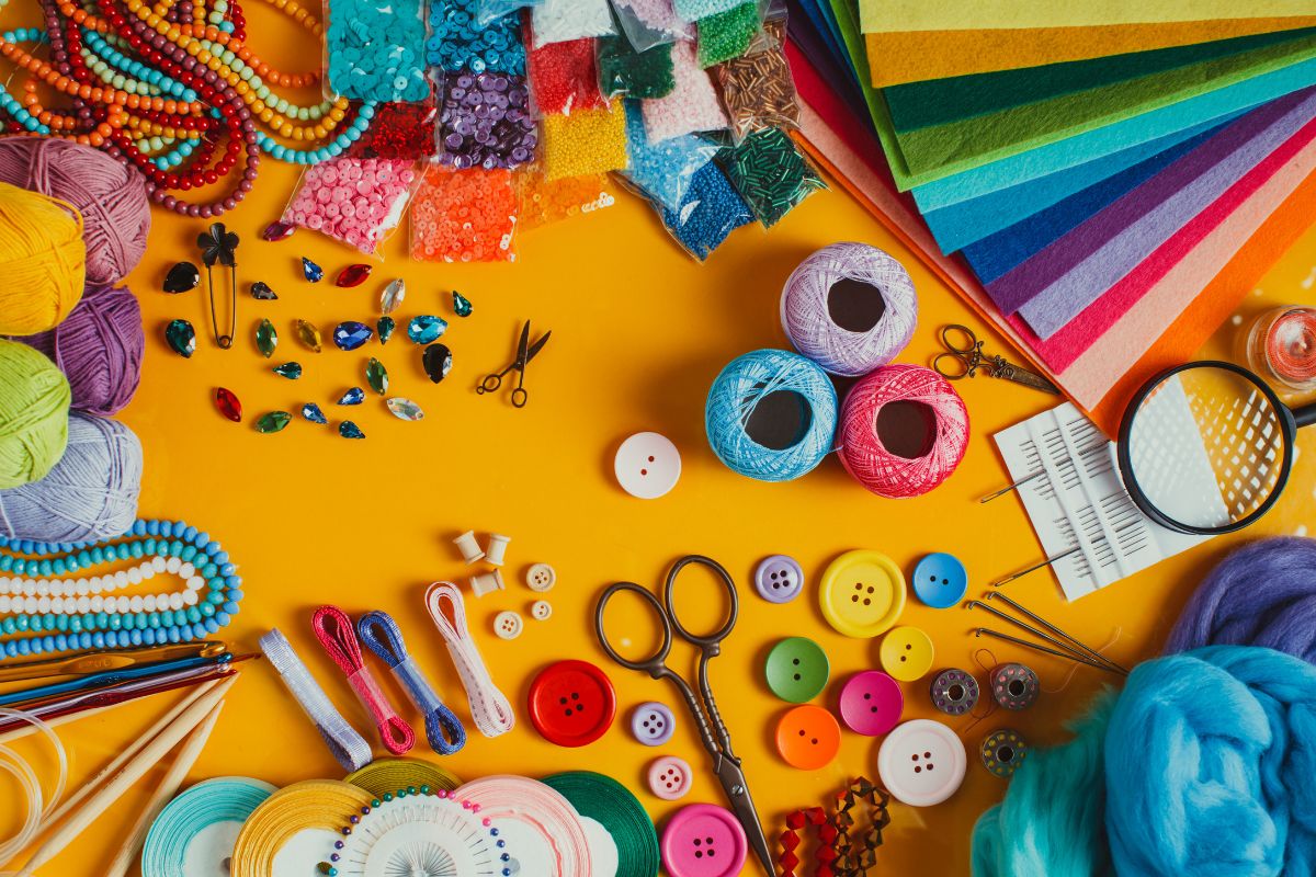 The photo tells about different kinds of unused hobby supplies that can be a waste of money, borrowing or buying secondhand is another way to cut costs.