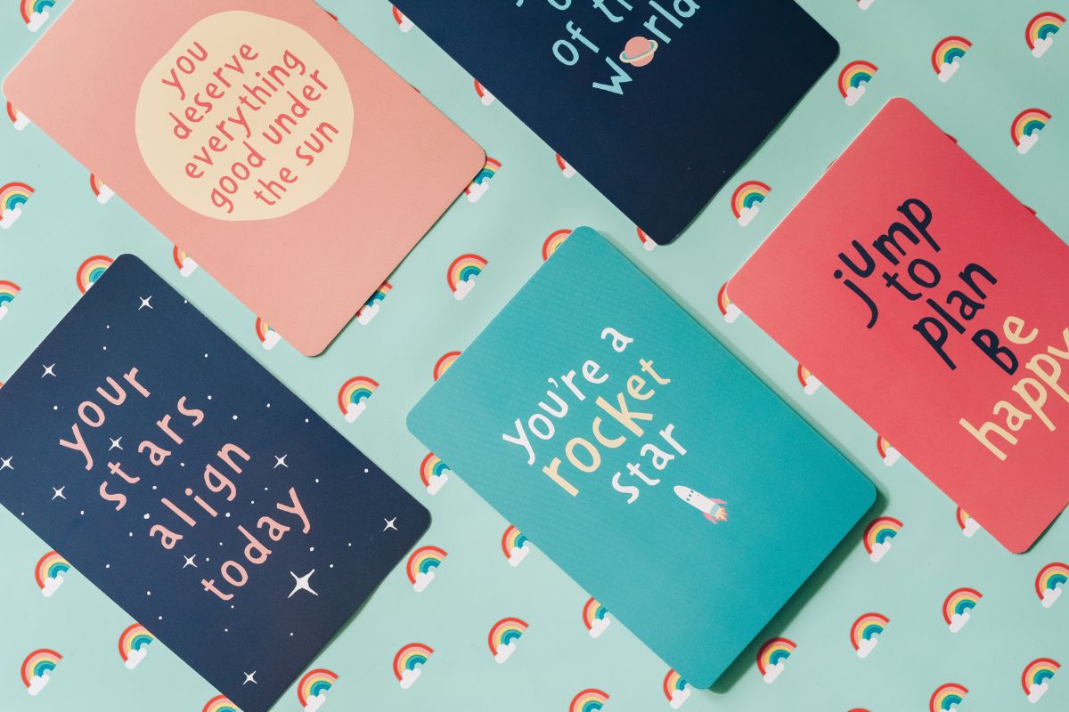 The picture of cards with notes in different colors indicating expensive greeting cards adds up fast, spending less on cards means more money for the actual gift.