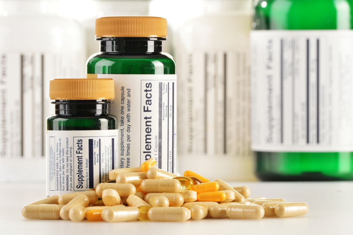 The image shows medicines and bottles in the table indicating that trendy wellness products cost more than they are worth, researching alternatives can help avoid spending.