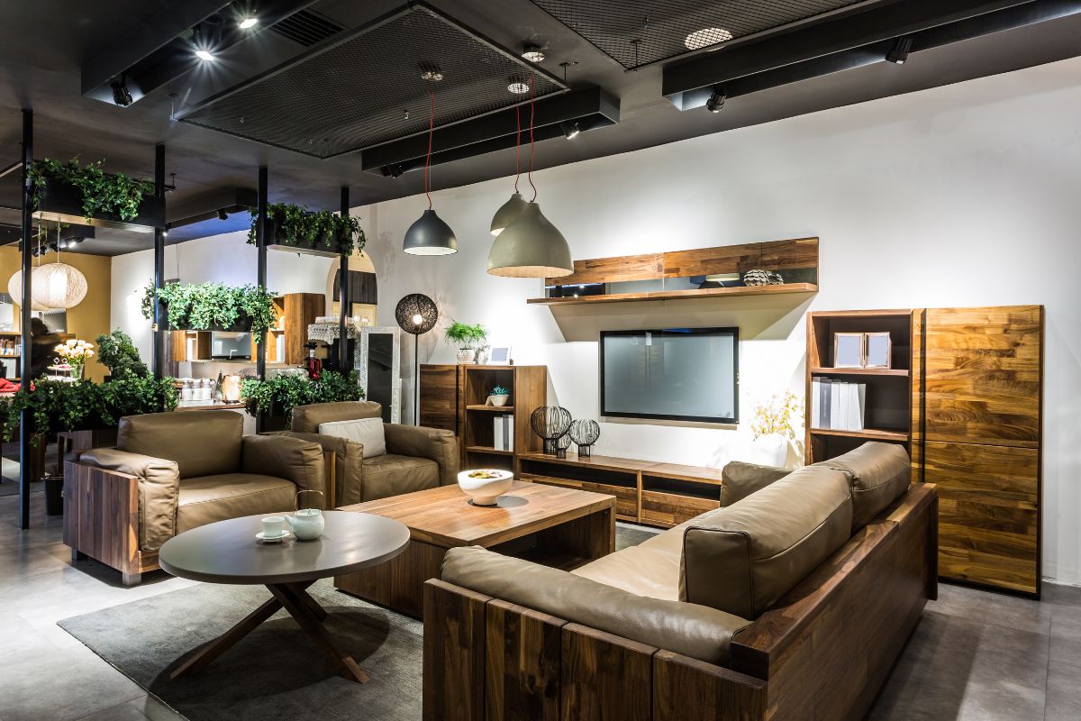 The photo tells about a living room with high-end furniture and home decorations that can be a high price, and shopping smart can keep home updates affordable.