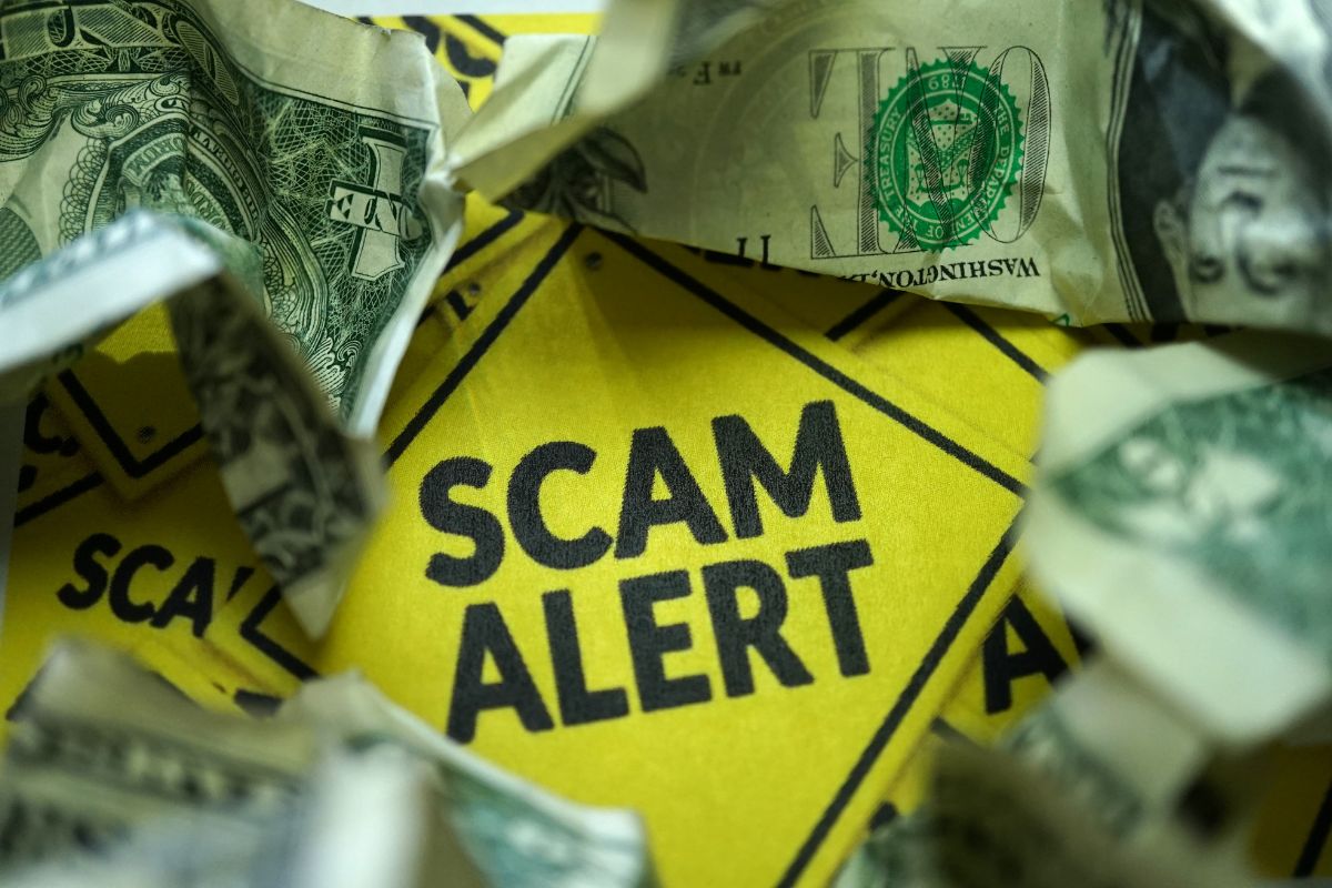 The image tells about crumpled dollar bills and yellow papers with notes which refers to falling for a get-rich-quick scheme leading to big losses, building wealth takes patience and smart decisions.