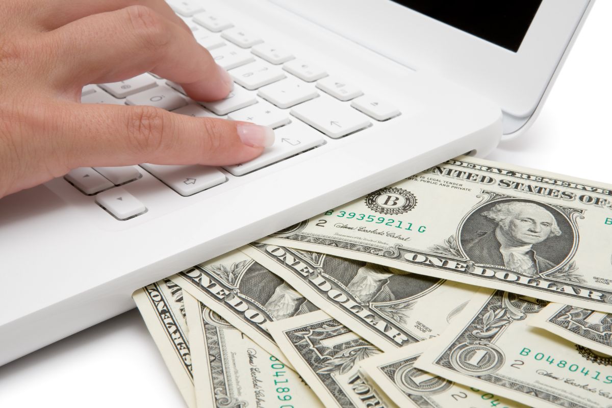 The image shows a lady making money online.