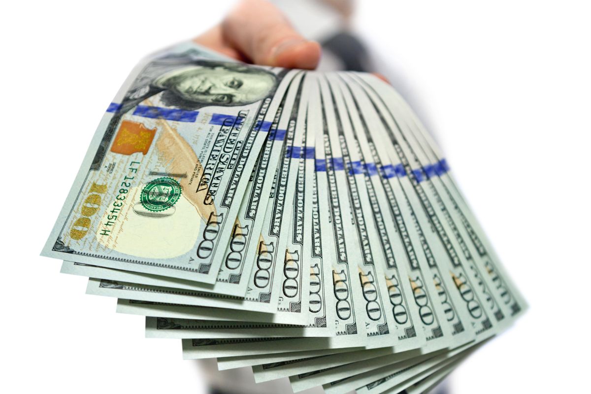 The image shows a financial independent man.